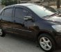 Toyota Vios 2009 - Cần bán xe Toyota Vios năm 2009, màu đen xe gia đình