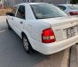 Mazda 323F 2004 - Cần bán gấp Mazda 323F GLX đời 2004, màu trắng