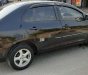 Toyota Vios 2009 - Cần bán xe Toyota Vios năm 2009, màu đen xe gia đình