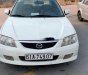 Mazda 323F 2004 - Cần bán gấp Mazda 323F GLX đời 2004, màu trắng