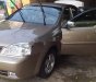 Daewoo Lacetti 2005 - Cần bán Daewoo Lacetti năm sản xuất 2005, màu vàng, xe nhập, 150tr