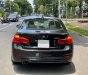 BMW 3 Series 2016 - Cần bán BMW 3 Series 320i sản xuất năm 2016, màu đen