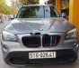 BMW X1   2010 - Cần bán xe BMW X1 đời 2010, màu bạc, xe nhập