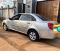 Daewoo Lacetti 2010 - Cần bán xe Daewoo Lacetti MT sản xuất năm 2010, màu bạc xe gia đình