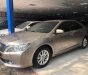 Toyota Camry 2014 - Cần bán lại xe Toyota Camry 2.0 sản xuất 2014, màu vàng chính chủ