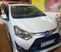 Toyota Wigo 2018 - Cần bán gấp chiếc Toyota Wigo AT, đời 2018, màu trắng, xe nhập khẩu, xe còn mới