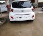 Hyundai Grand i10 2015 - Cần bán gấp Hyundai Grand i10 sản xuất 2015, màu trắng, xe nhập