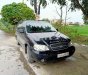 Kia Carnival 2009 - Cần bán gấp Kia Carnival năm 2009, màu đen, nhập khẩu nguyên chiếc giá cạnh tranh