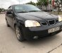 Daewoo Lacetti   2004 - Cần bán gấp Daewoo Lacetti đời 2004, màu đen