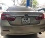 Toyota Camry 2014 - Cần bán lại xe Toyota Camry 2.0 sản xuất 2014, màu vàng chính chủ