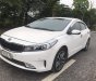 Kia Cerato 2016 - Bán gấp chiếc Kia Cerato AT, sản xuất 2016 màu trắng nhập khẩu nguyên chiếc, giá rẻ