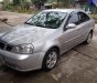 Daewoo Lacetti 2004 - Bán ô tô Daewoo Lacetti MT sản xuất 2004, màu bạc, xe nhập số sàn