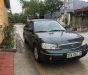 Ford Laser 2004 - Xe Ford Laser 2004, màu xanh lam