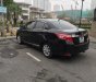 Toyota Vios 2014 - Gia đình cần bán chiếc Toyota Vios E MT sản xuất năm 2014, màu đen giá cạnh tranh