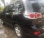 Hyundai Santa Fe 2008 - Gia đình cần bán nhanh chiếc Hyundai Santa Fe sản xuất 2008, màu đen, xe nhập, giá thấp