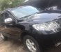 Hyundai Santa Fe 2008 - Gia đình cần bán nhanh chiếc Hyundai Santa Fe sản xuất 2008, màu đen, xe nhập, giá thấp