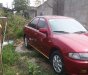 Mazda 323 2000 - Cần bán gấp Mazda 323 sản xuất năm 2000, màu đỏ chính chủ