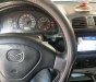 Mazda 323   2002 - Bán xe Mazda 323 năm 2002, màu đen, nhập khẩu  