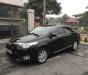 Toyota Vios 2014 - Gia đình cần bán chiếc Toyota Vios E MT sản xuất năm 2014, màu đen giá cạnh tranh