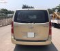 Hyundai Starex 2012 - Cần bán gấp Hyundai Starex MT năm sản xuất 2012, màu vàng số sàn, giá 453tr