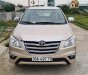 Toyota Innova 2014 - Bán Toyota Innova năm sản xuất 2014, màu vàng, xe gia đình
