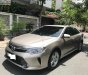 Toyota Camry   2014 - Bán ô tô Toyota Camry 2.5Q năm 2014, màu vàng, giá 792tr