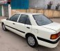 Mazda 323 1995 - Bán Mazda 323 đời 1995, màu trắng chính chủ, giá tốt