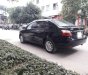 Toyota Vios 2011 - Cần bán xe Toyota Vios MT năm 2011, màu đen giá cạnh tranh