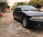 Mitsubishi Lancer GLXI 1.6 MT 2003 - Cần bán Mitsubishi Lancer GLXI 1.6 MT sản xuất 2003, màu xanh lam xe gia đình