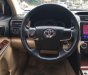 Toyota Camry 2014 - Cần bán gấp Toyota Camry 2.0E năm 2014, màu đen, 670tr