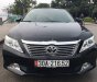 Toyota Camry 2014 - Cần bán gấp Toyota Camry 2.0E năm 2014, màu đen, 670tr