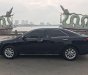 Toyota Camry 2014 - Cần bán gấp Toyota Camry 2.0E năm 2014, màu đen, 670tr