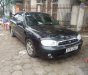 Kia Spectra 2005 - Cần bán gấp Kia Spectra năm 2005, màu đen