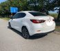 Mazda 2 2015 - Cần bán gấp Mazda 2 đời 2015, màu trắng, xe nhập chính chủ