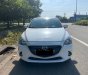 Mazda 2 2015 - Cần bán gấp Mazda 2 đời 2015, màu trắng, xe nhập chính chủ