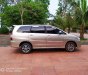 Toyota Innova 2.0E 2015 - Tôi cần bán chiếc xe ô tô Toyota Innova 2.0E màu ghi vàng 2014