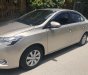 Toyota Vios E 2015 - Cần bán gấp Toyota Vios E đời 2015, màu vàng, ít sử dụng