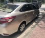 Toyota Vios E 2015 - Cần bán gấp Toyota Vios E đời 2015, màu vàng, ít sử dụng