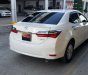 Toyota Corolla altis 1.8E CVT 2017 - Bán Toyota Corolla altis 1.8E CVT đời 2017, màu trắng, số tự động