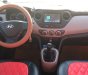 Hyundai Grand i10 2019 - Gia đình tôi cần bán Hyundai I10 2019, số sàn, màu trắng, sedan