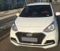 Hyundai Grand i10 2019 - Gia đình tôi cần bán Hyundai I10 2019, số sàn, màu trắng, sedan