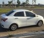 Hyundai Grand i10 2019 - Gia đình tôi cần bán Hyundai I10 2019, số sàn, màu trắng, sedan