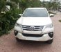 Toyota Fortuner MT 2019 - Gia đình cần bán Fortuner 2019, số sàn, máy dầu, màu trắng