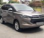 Toyota Innova 2017 - Gia đình tôi cần bán Toyota Innova 2017, số sàn, màu xám