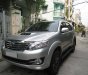 Toyota Fortuner 2015 - Nhà cần bán Fortuner 2015 số sàn, máy dầu, màu bạc cọp zin