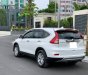 Honda CR V 2015 - Gia đình cần bán xe Honda Crv 2015, bản 2.0, màu trắng còn mới 