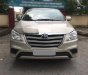 Toyota Innova 2016 - Nhà cần bán Innova 2016 số sàn, màu vàng ánh kim