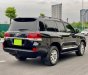 Toyota Land Cruiser 2015 - Nhà cần bán Toyota Lancuiser VX 2015, số tự động, màu đen