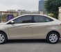 Toyota Vios 2019 - Bán lại Toyota Vios 2019 số tự động, bảng E, màu vàng cát