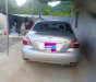 Toyota Vios 2011 - Cần bán gấp Toyota Vios đời 2011, màu bạc xe gia đình